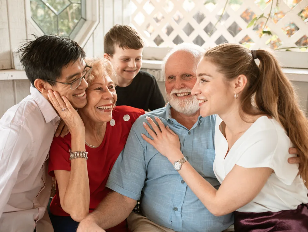 A family of three generations together at home