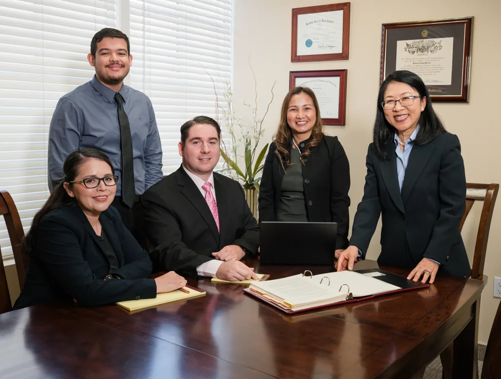 Desert Law Group attorneys reviewing documents with clients